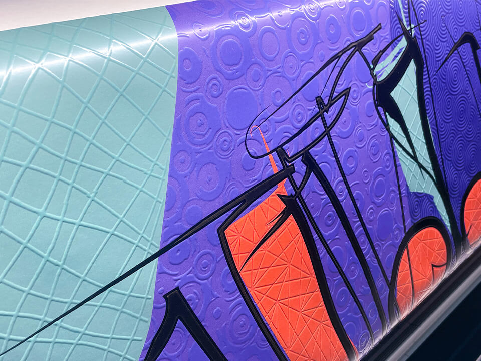 Close up of a colorful textural print printing on a Dimensor S textural printer.